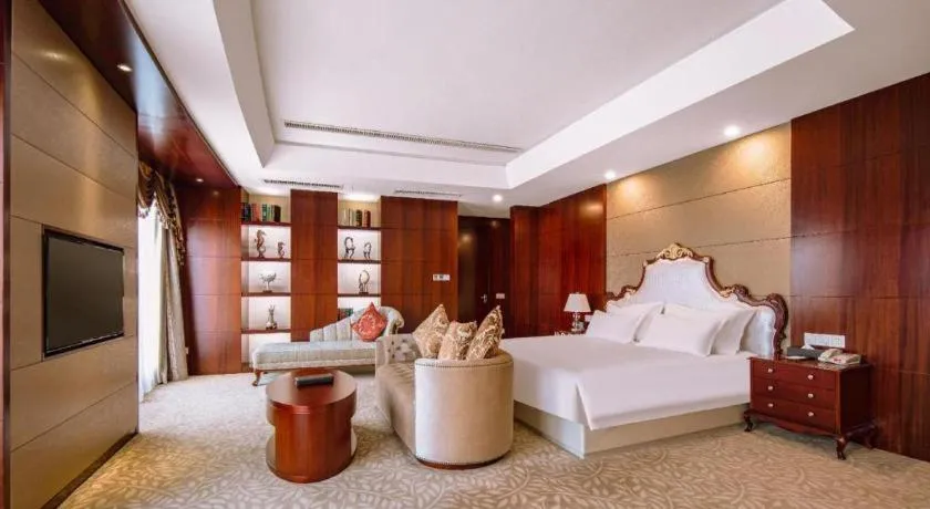 Bed in New Century Hotel Putuo Zhoushan