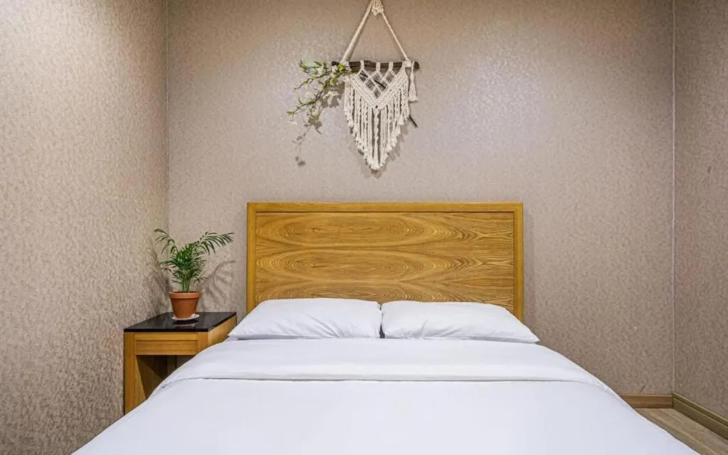 Bed in Seogwipo (Seongsan) Beach Hotel