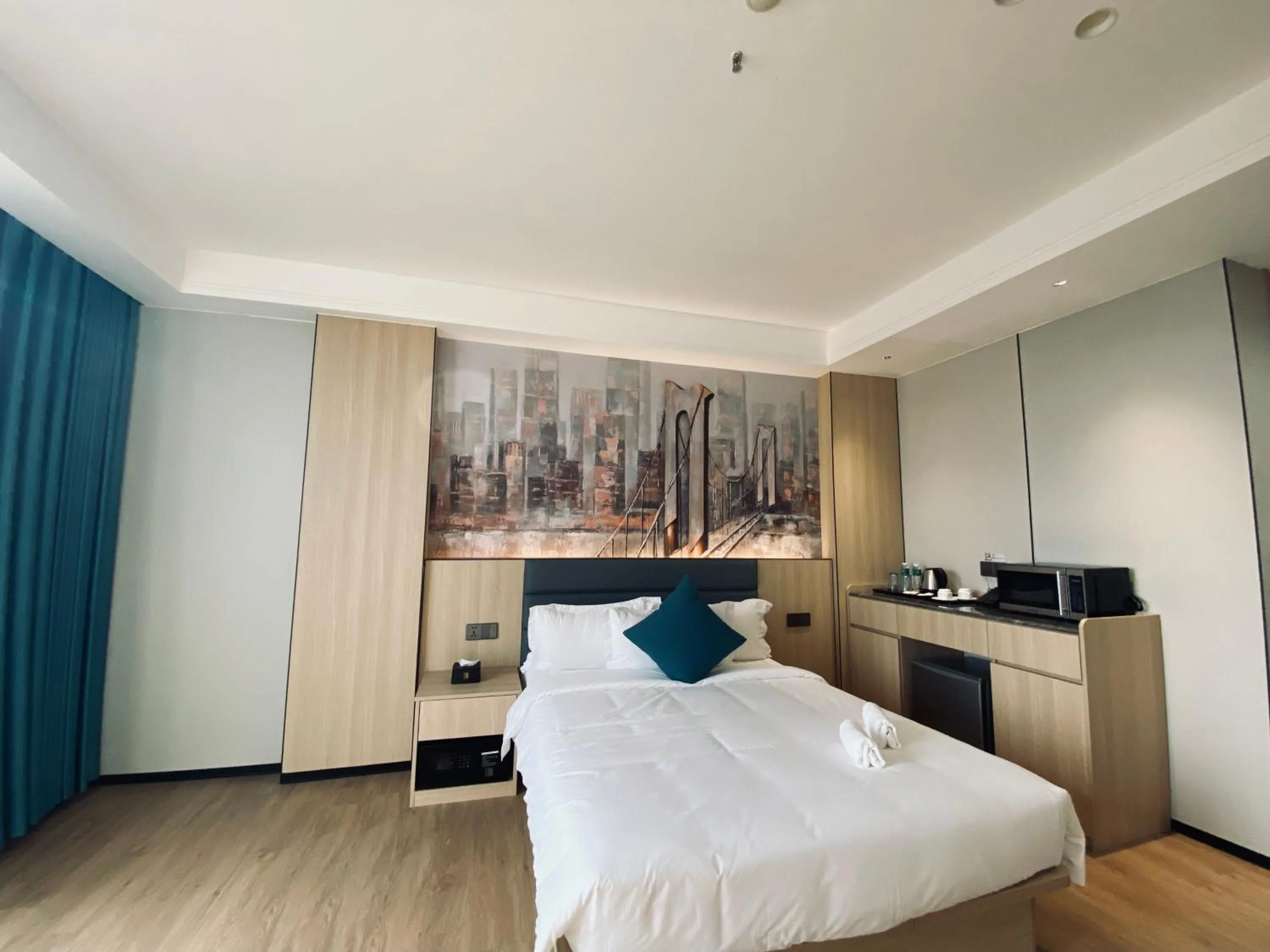 Bed in Fan's Hotel Palo