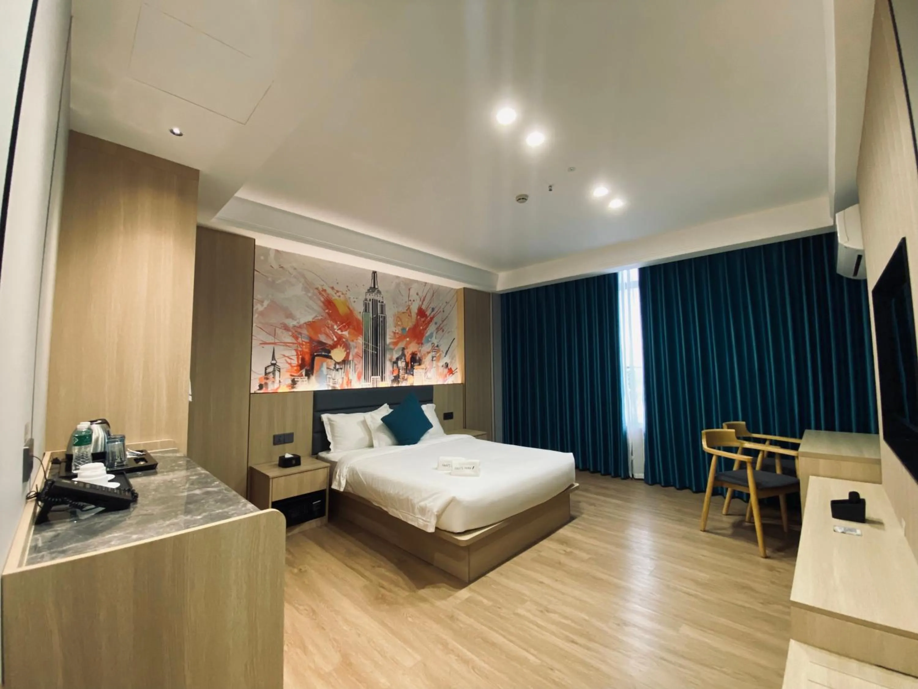 Bed in Fan's Hotel Palo