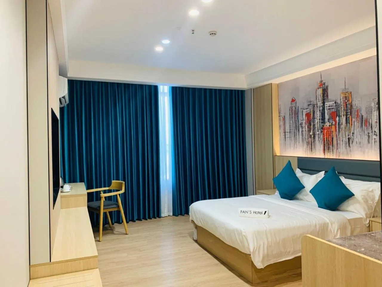 Bed in Fan's Hotel Palo