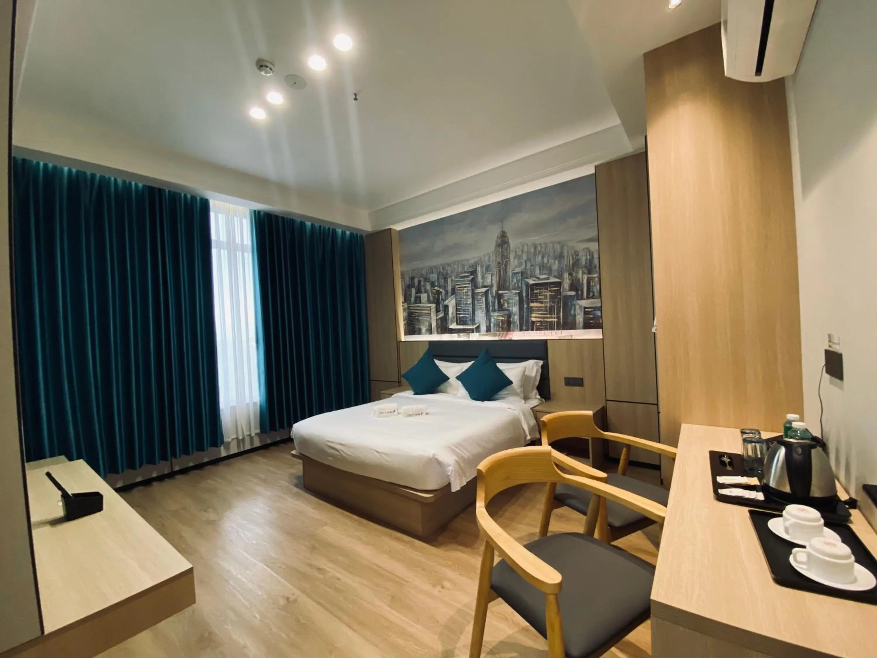 Bed in Fan's Hotel Palo