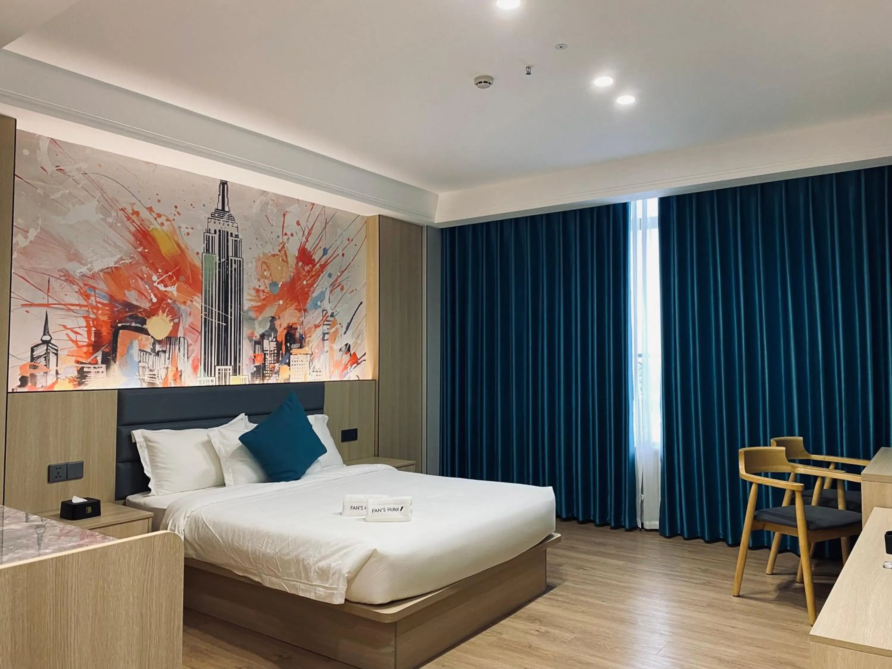 Bed in Fan's Hotel Palo