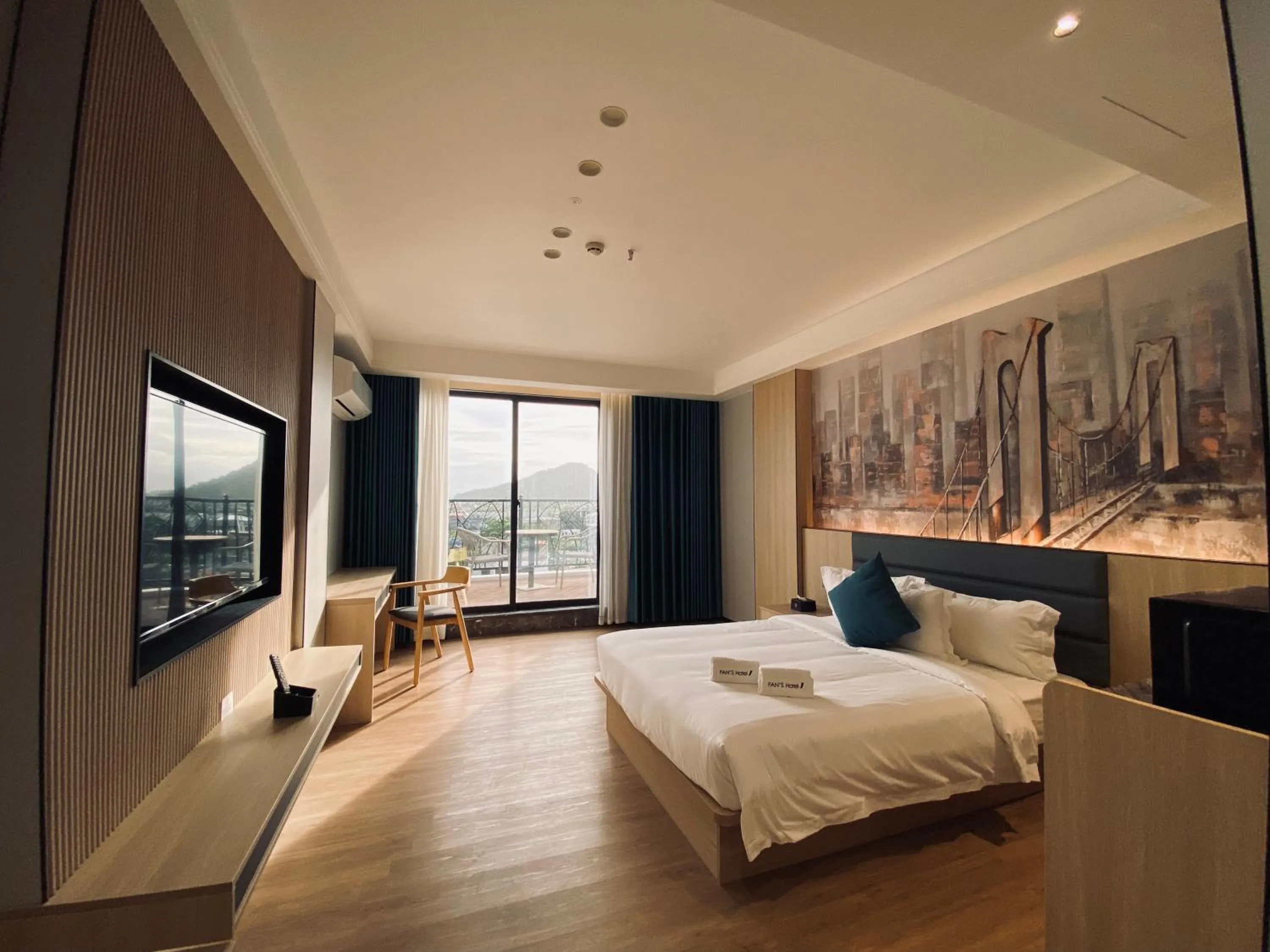 Bed in Fan's Hotel Palo