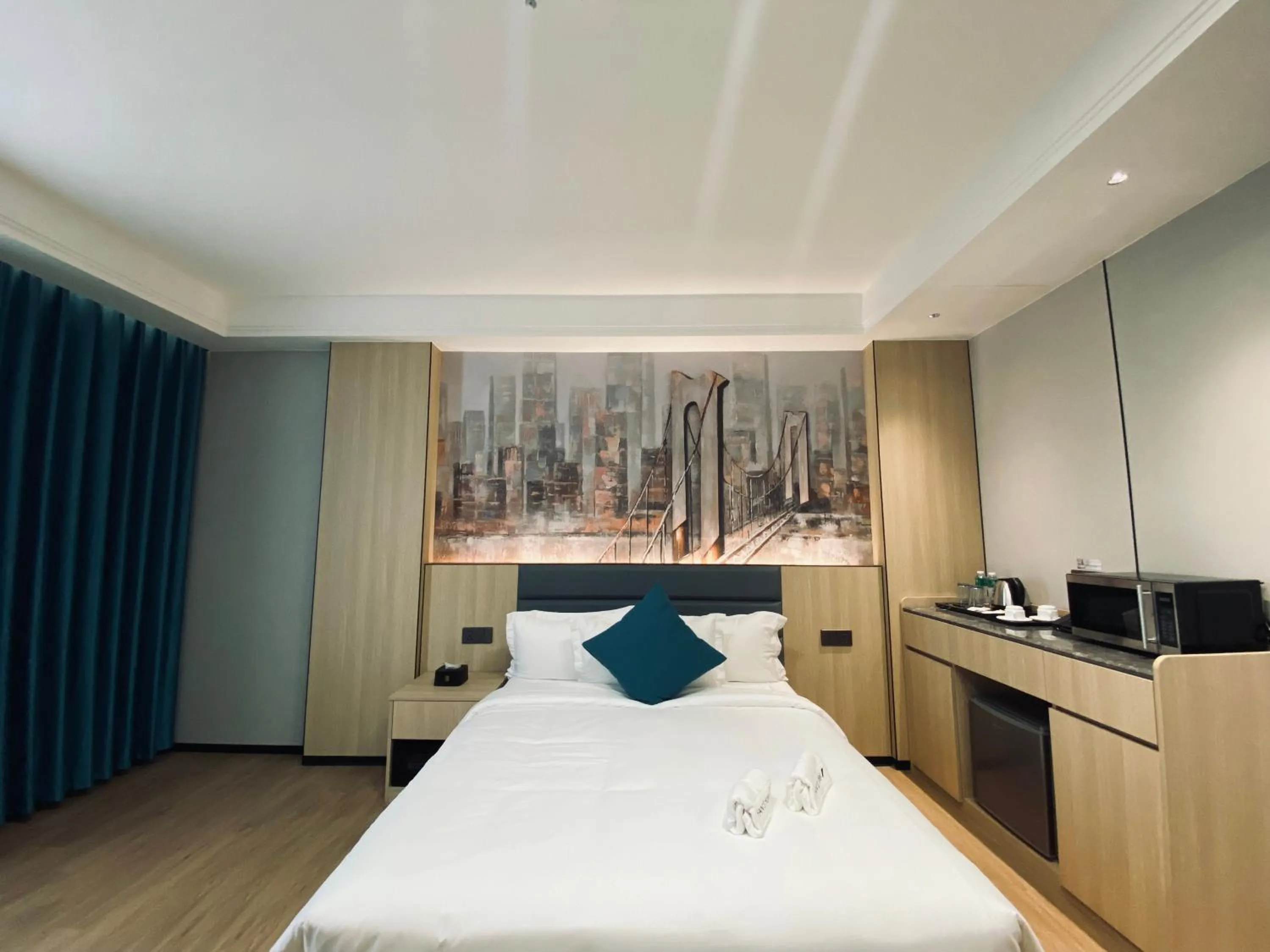 Bed in Fan's Hotel Palo