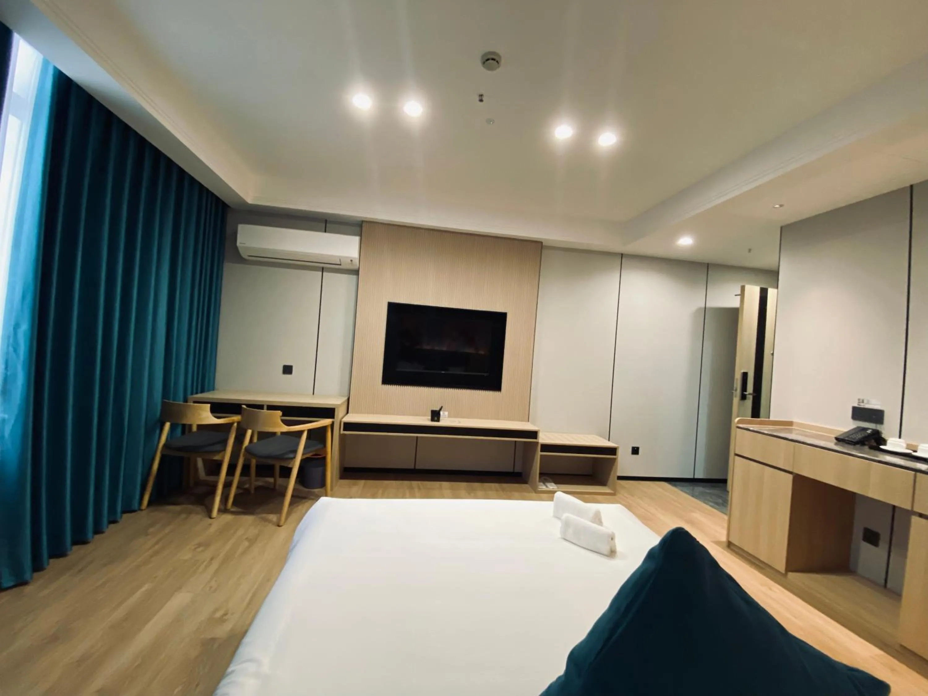 Living room, Bed in Fan's Hotel Palo