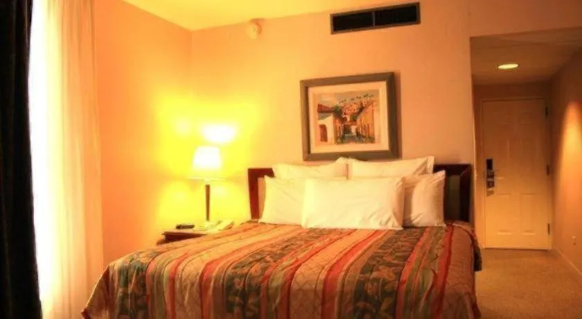 Bed in Hotel Honduras Maya