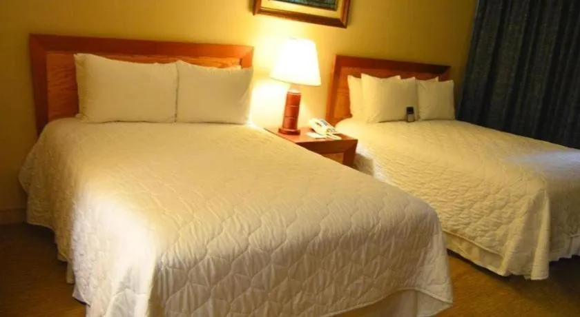 Bed in Hotel Honduras Maya