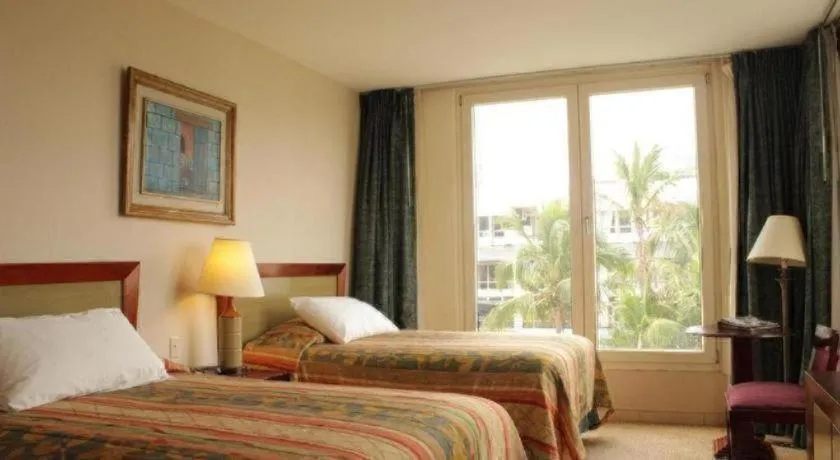 Bed in Hotel Honduras Maya