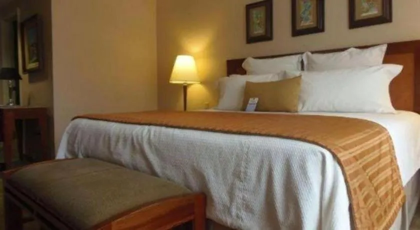 Bed in Hotel Honduras Maya