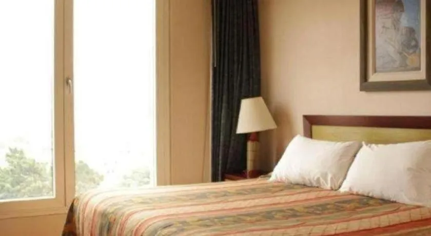 Bed in Hotel Honduras Maya