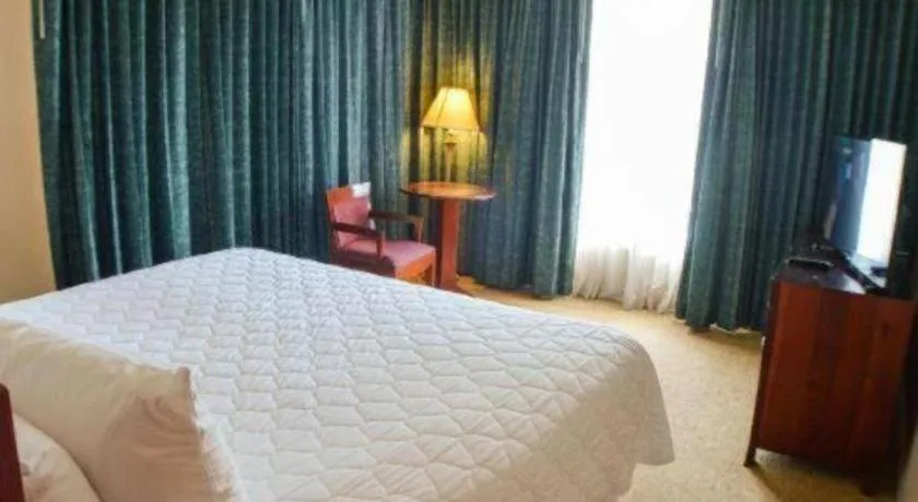 Bed in Hotel Honduras Maya