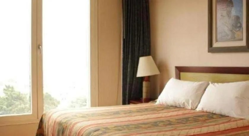 Bed in Hotel Honduras Maya