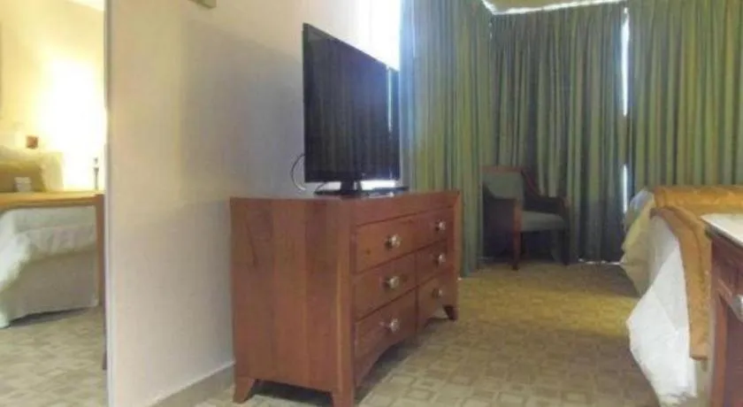 Bed in Hotel Honduras Maya