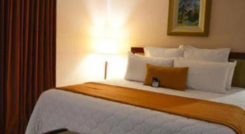 Bed in Hotel Honduras Maya