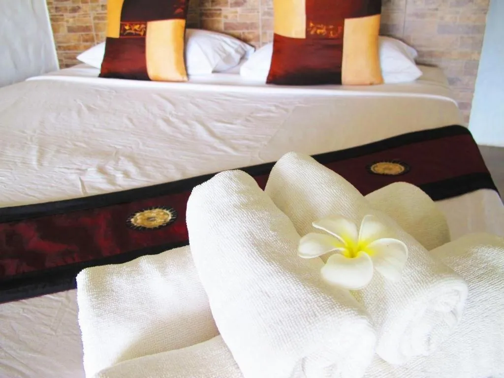 Bed in Tamarina Resort