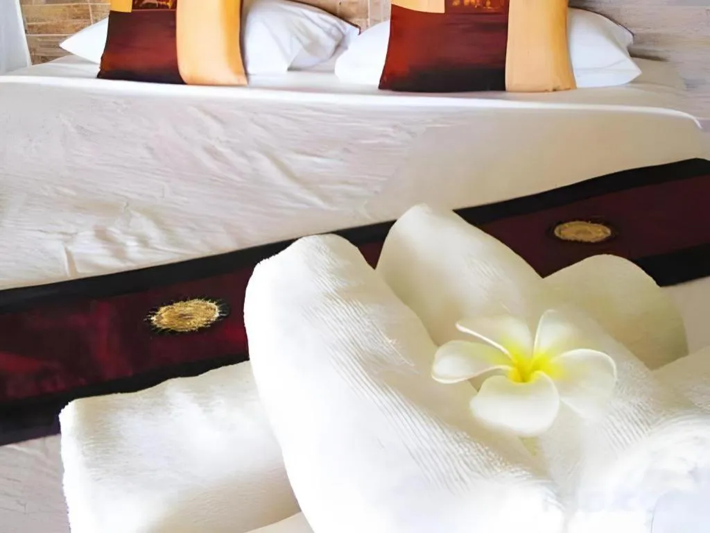 Bed in Tamarina Resort