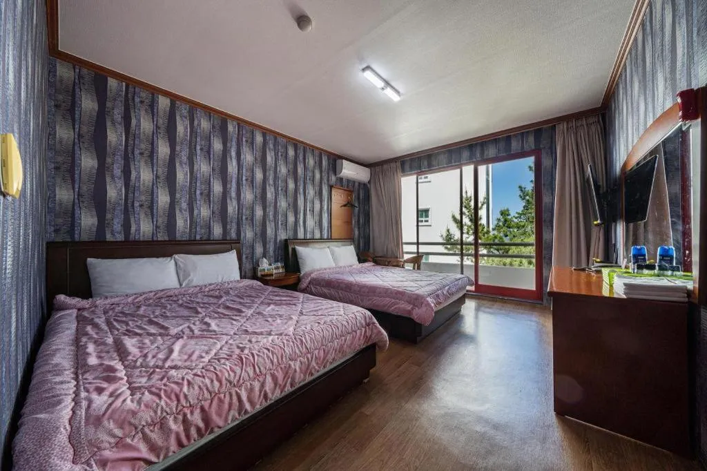 Bed in Gangneung Gyeongpodae Gangneung Motel