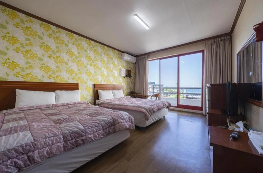 Bed in Gangneung Gyeongpodae Gangneung Motel