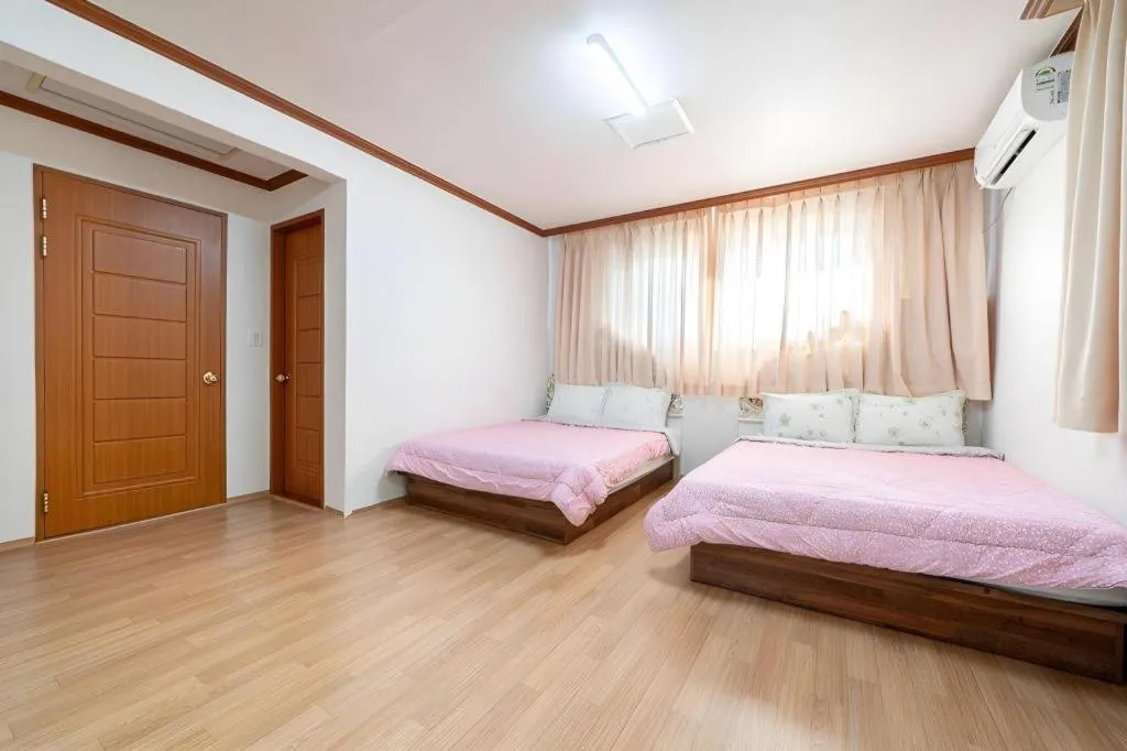 Bed in Gangneung Gyeongpodae Gangneung Motel