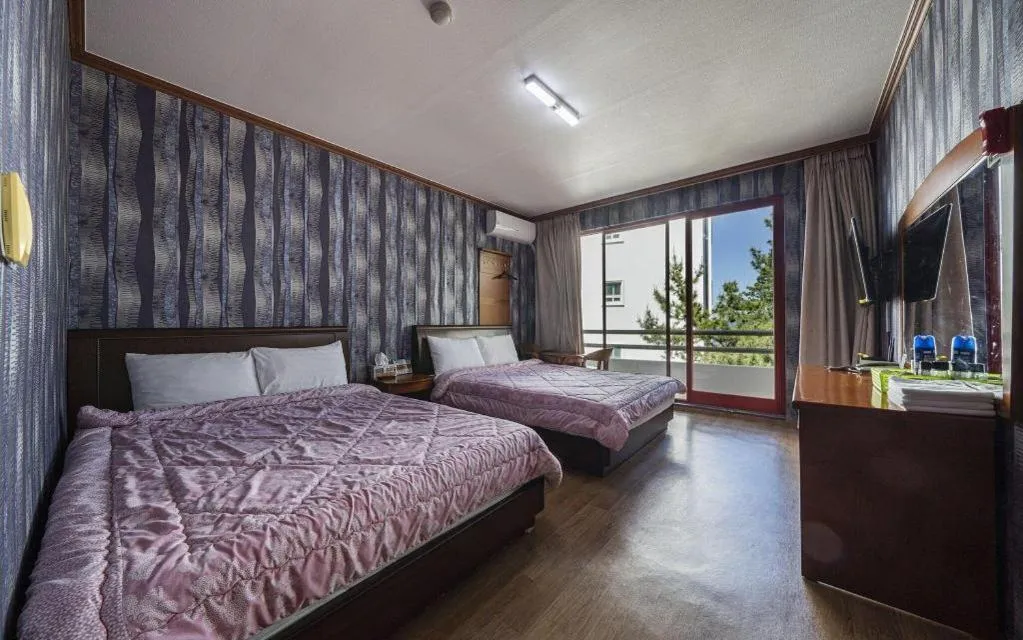 Bed in Gangneung Gyeongpodae Gangneung Motel