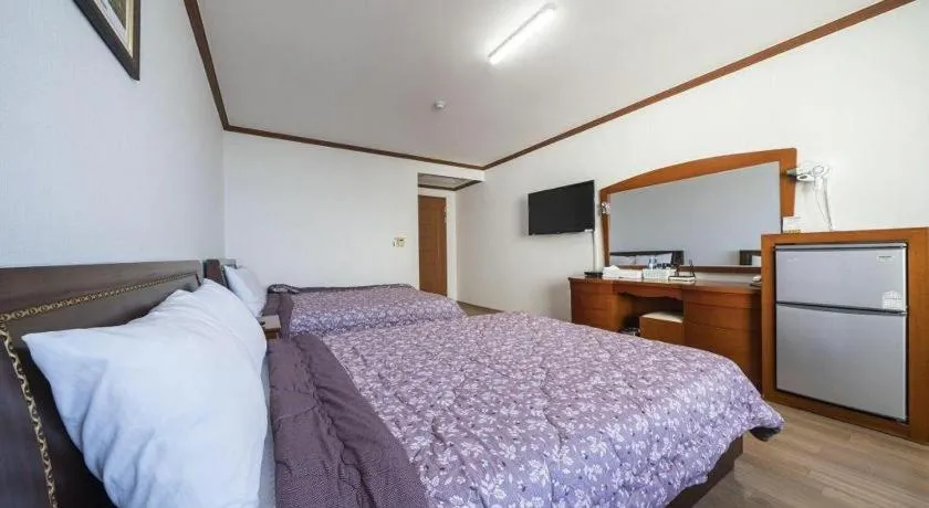Bed in Gangneung Gyeongpodae Gangneung Motel
