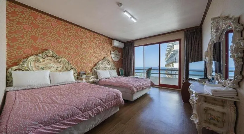 Bed in Gangneung Gyeongpodae Gangneung Motel