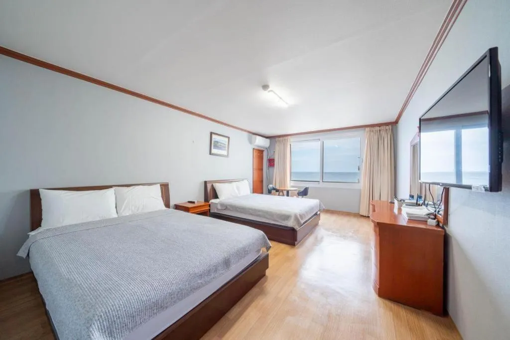 Bed in Gangneung Gyeongpodae Gangneung Motel