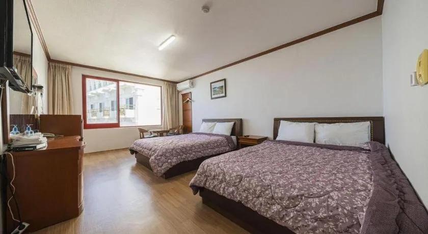 Bed in Gangneung Gyeongpodae Gangneung Motel