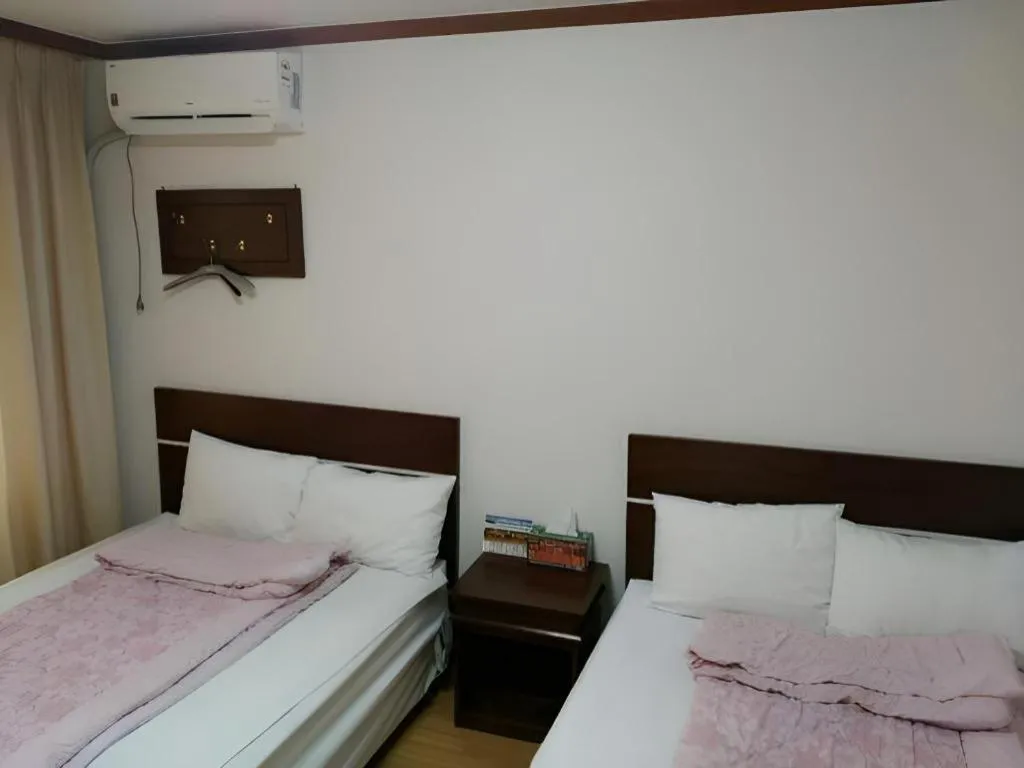 Bed in Gangneung Gyeongpodae Gangneung Motel