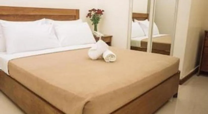 Bed in Ipil Suites Puerto Princesa