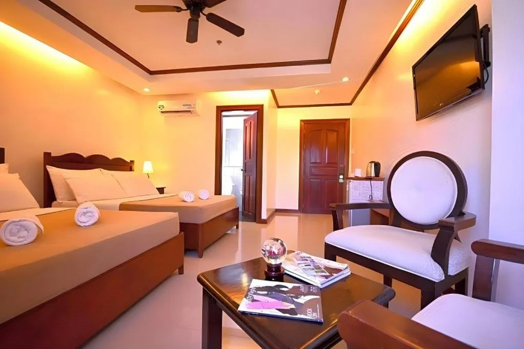 Bed in Ipil Suites Puerto Princesa