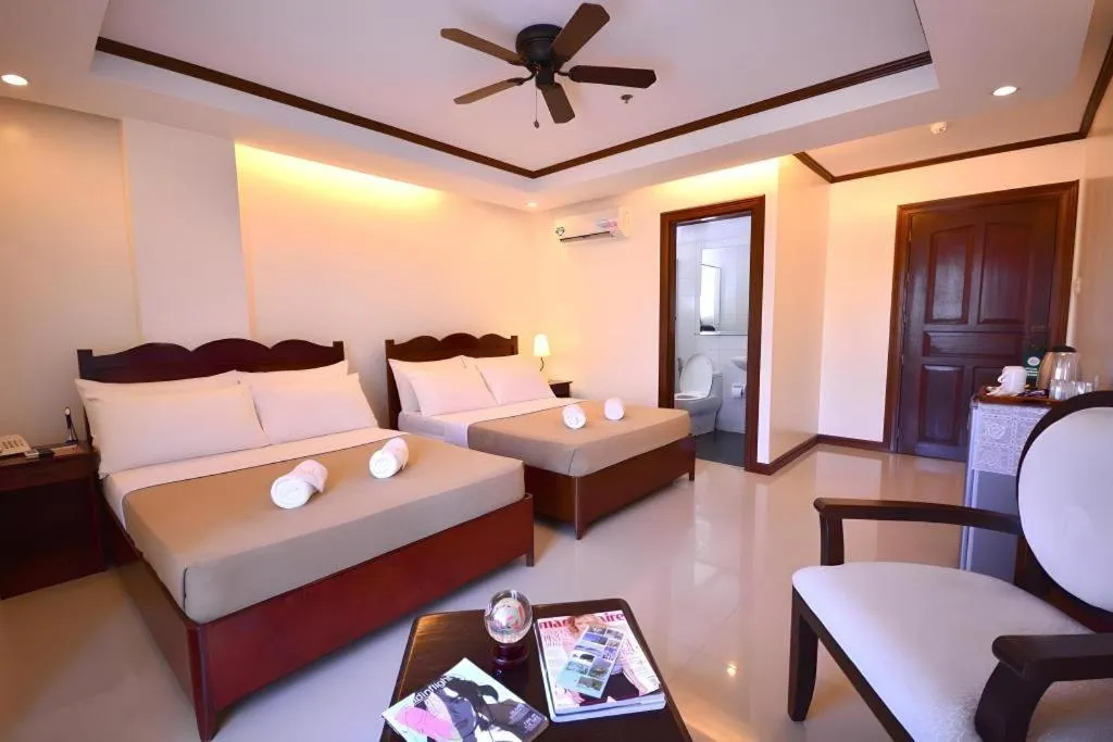 Bed in Ipil Suites Puerto Princesa