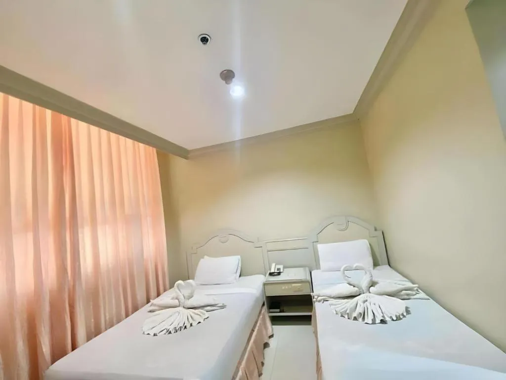 Bed in Cebu Northwinds Hotel