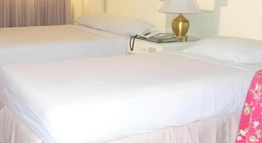 Bed in Cebu Northwinds Hotel