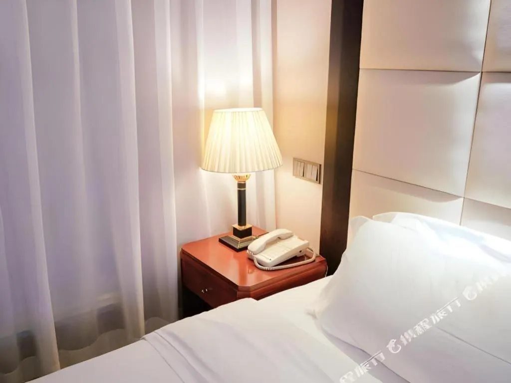 Bed in Shenzhen Bao Yue Hotel