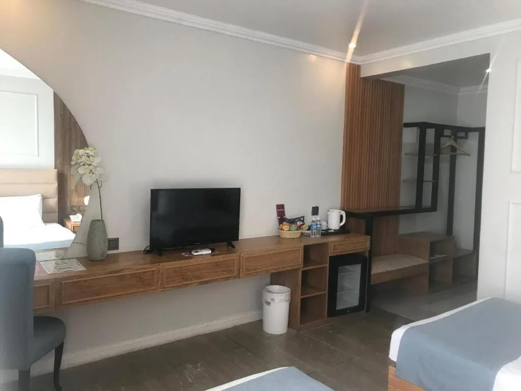 Bed in Queen Margarette Hotel