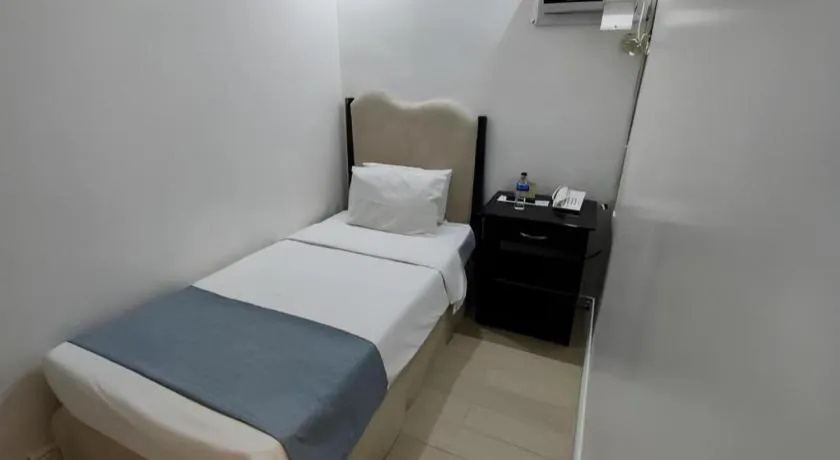 Bed in Queen Margarette Hotel
