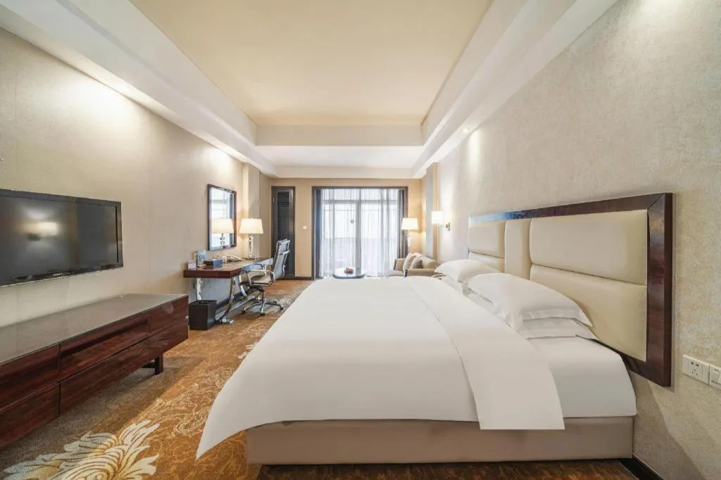 Bed in Country Garden Phoenix Hotel Yunfu