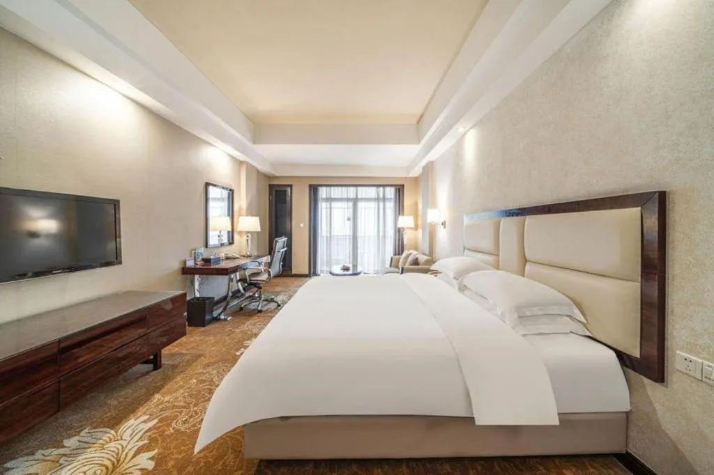 Bed in Country Garden Phoenix Hotel Yunfu