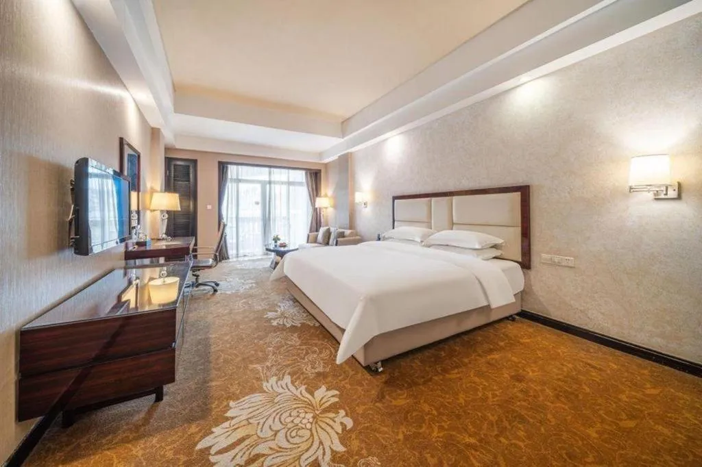 Bed in Country Garden Phoenix Hotel Yunfu