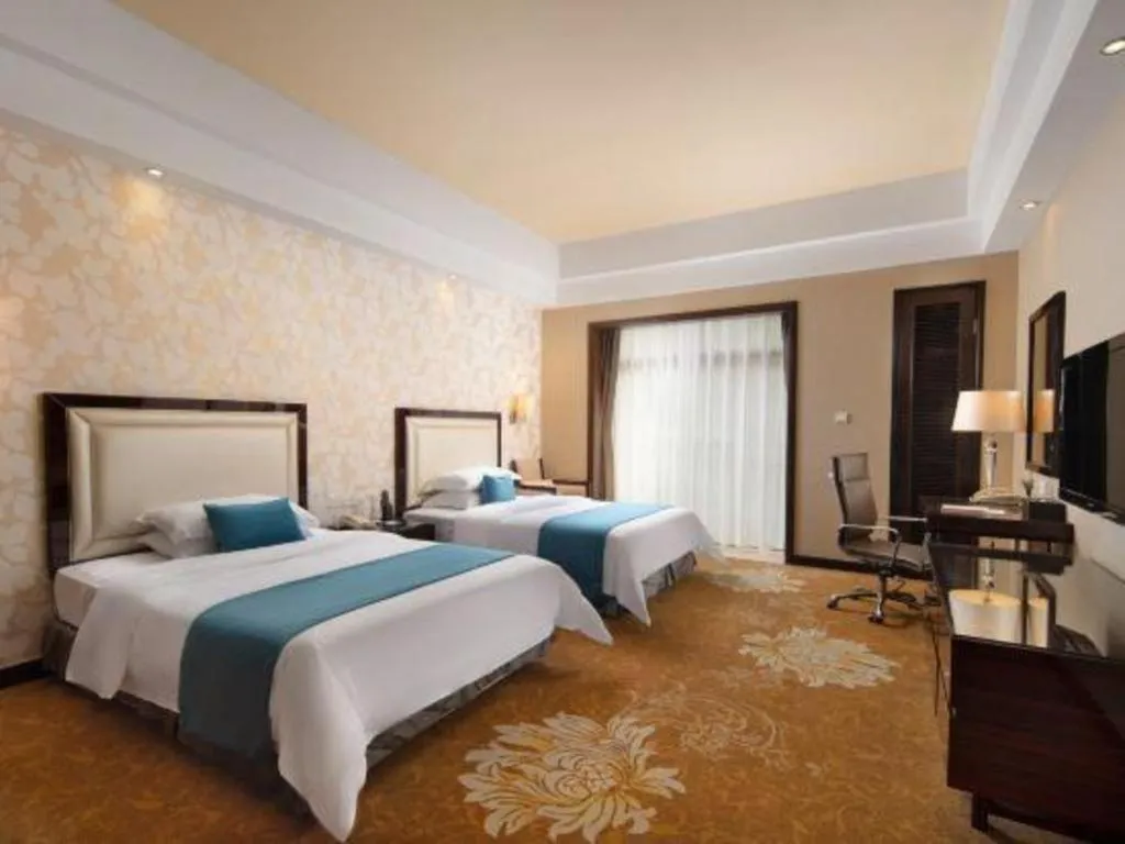 Bed in Country Garden Phoenix Hotel Yunfu