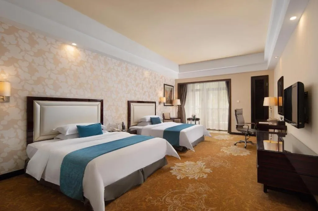 Bed in Country Garden Phoenix Hotel Yunfu