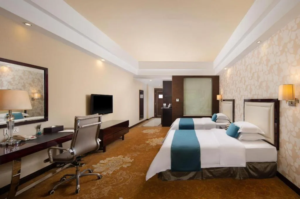 Bed in Country Garden Phoenix Hotel Yunfu