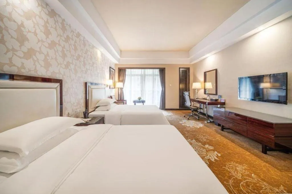 Bed in Country Garden Phoenix Hotel Yunfu