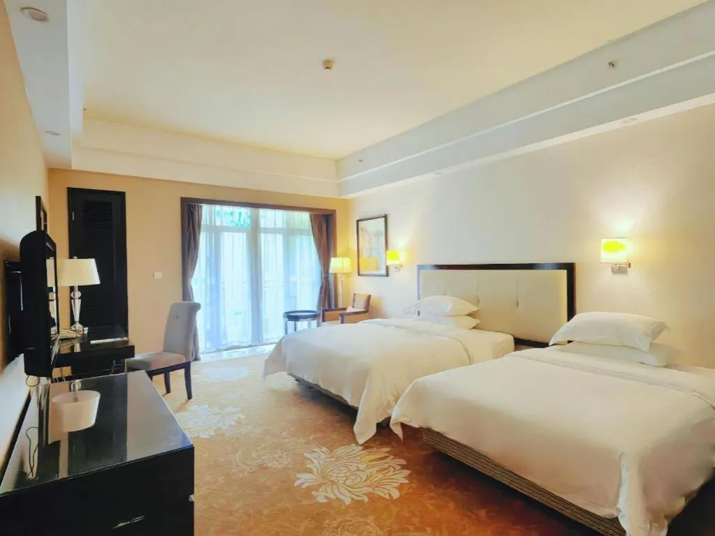 Bed in Country Garden Phoenix Hotel Yunfu