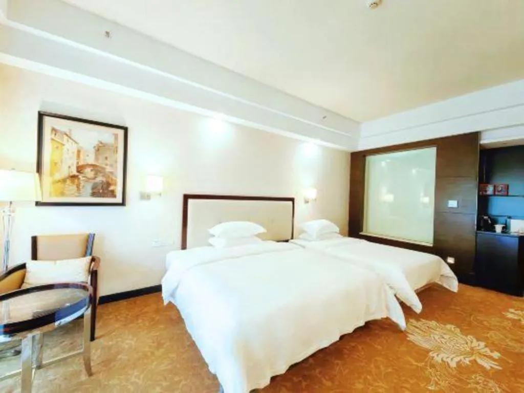 Bed in Country Garden Phoenix Hotel Yunfu