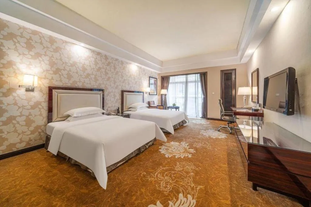 Bed in Country Garden Phoenix Hotel Yunfu