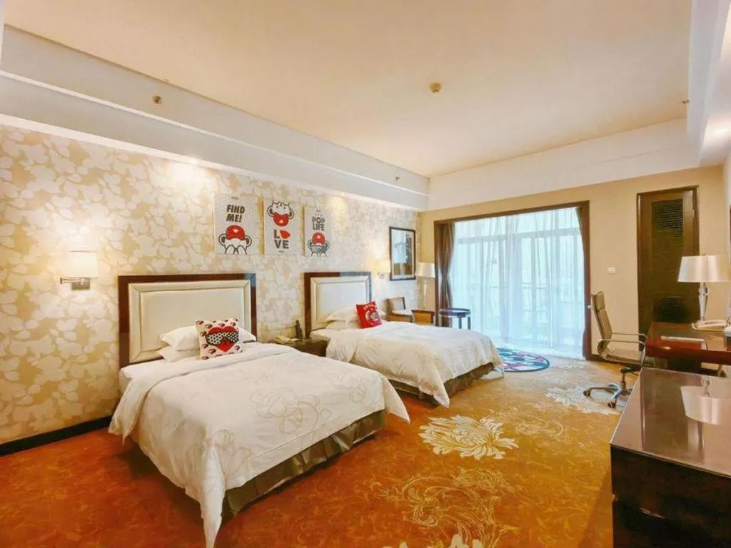 Bed in Country Garden Phoenix Hotel Yunfu