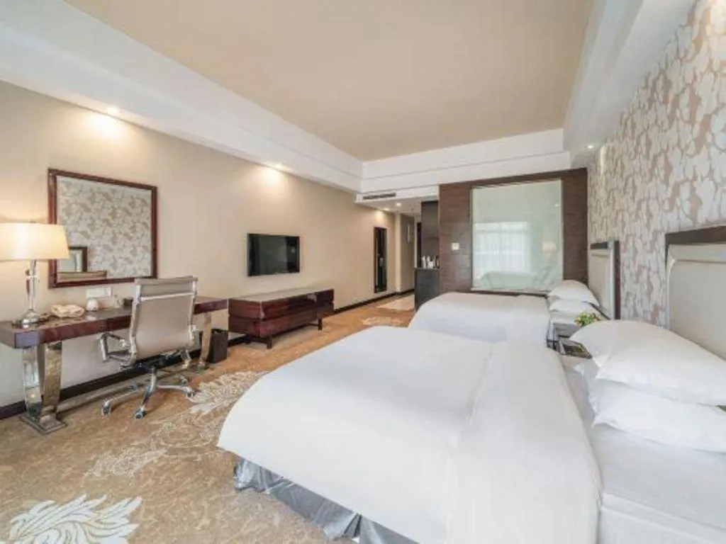 Bed in Country Garden Phoenix Hotel Yunfu